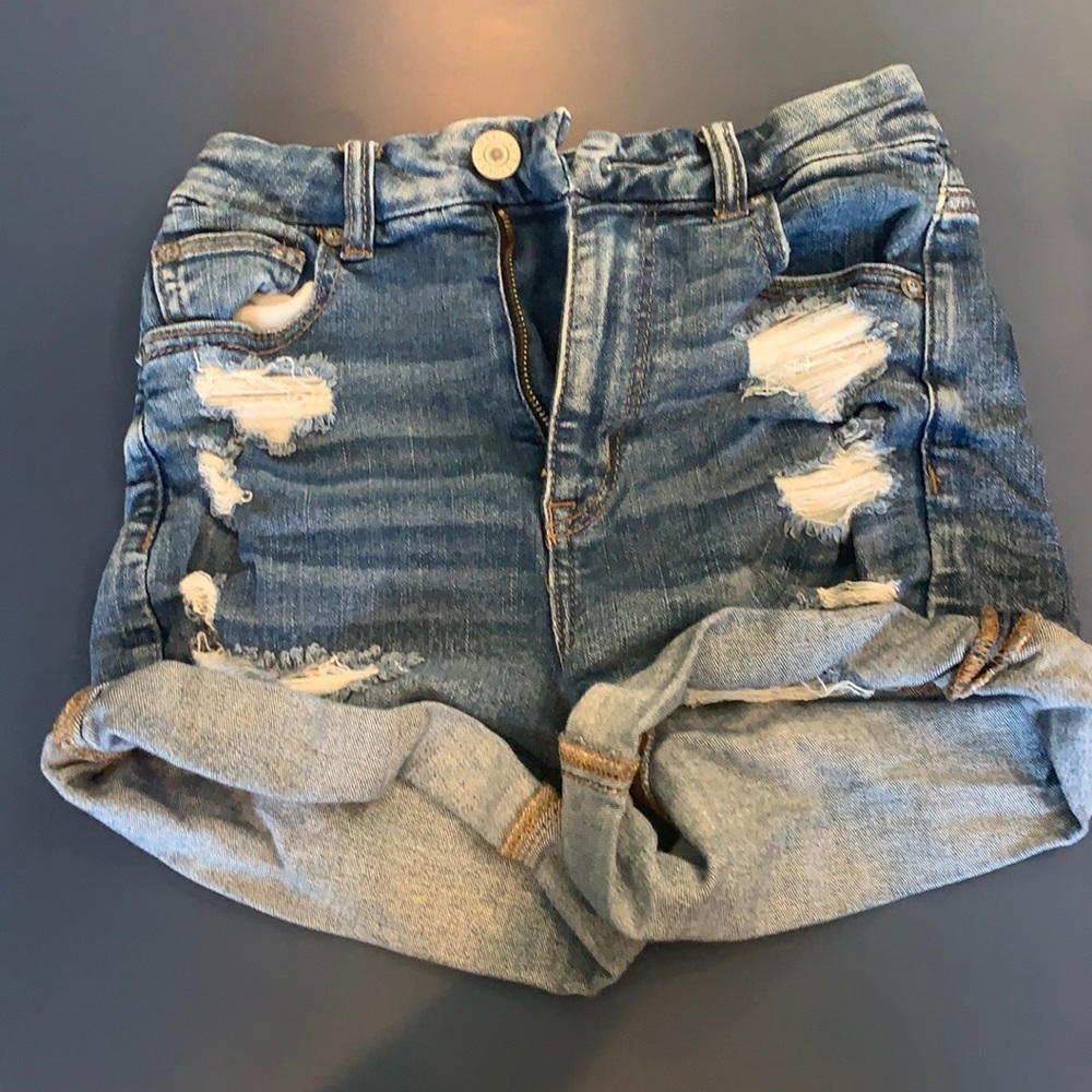 Ripped blue Jean shorts